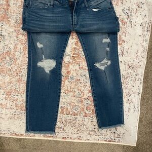 Women's Distressed Blue Jeans